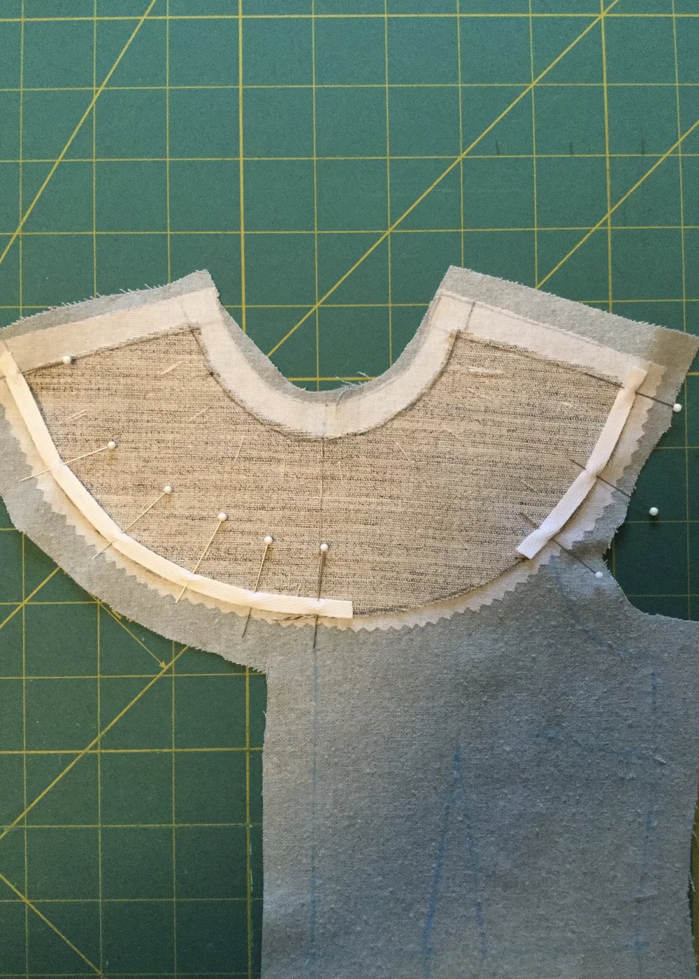 Twill tape pinned into place.
