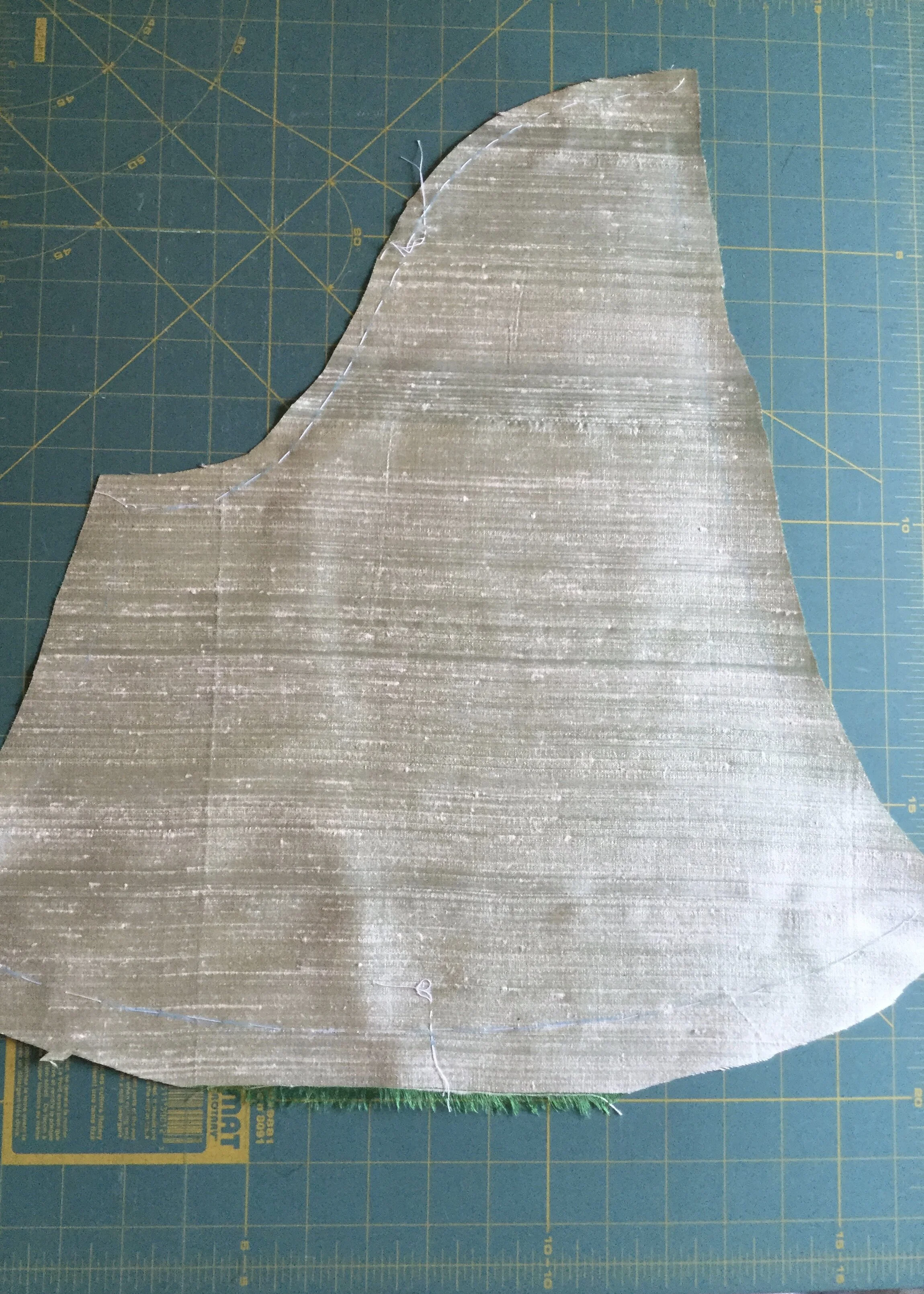 Cape lining, lower piece.