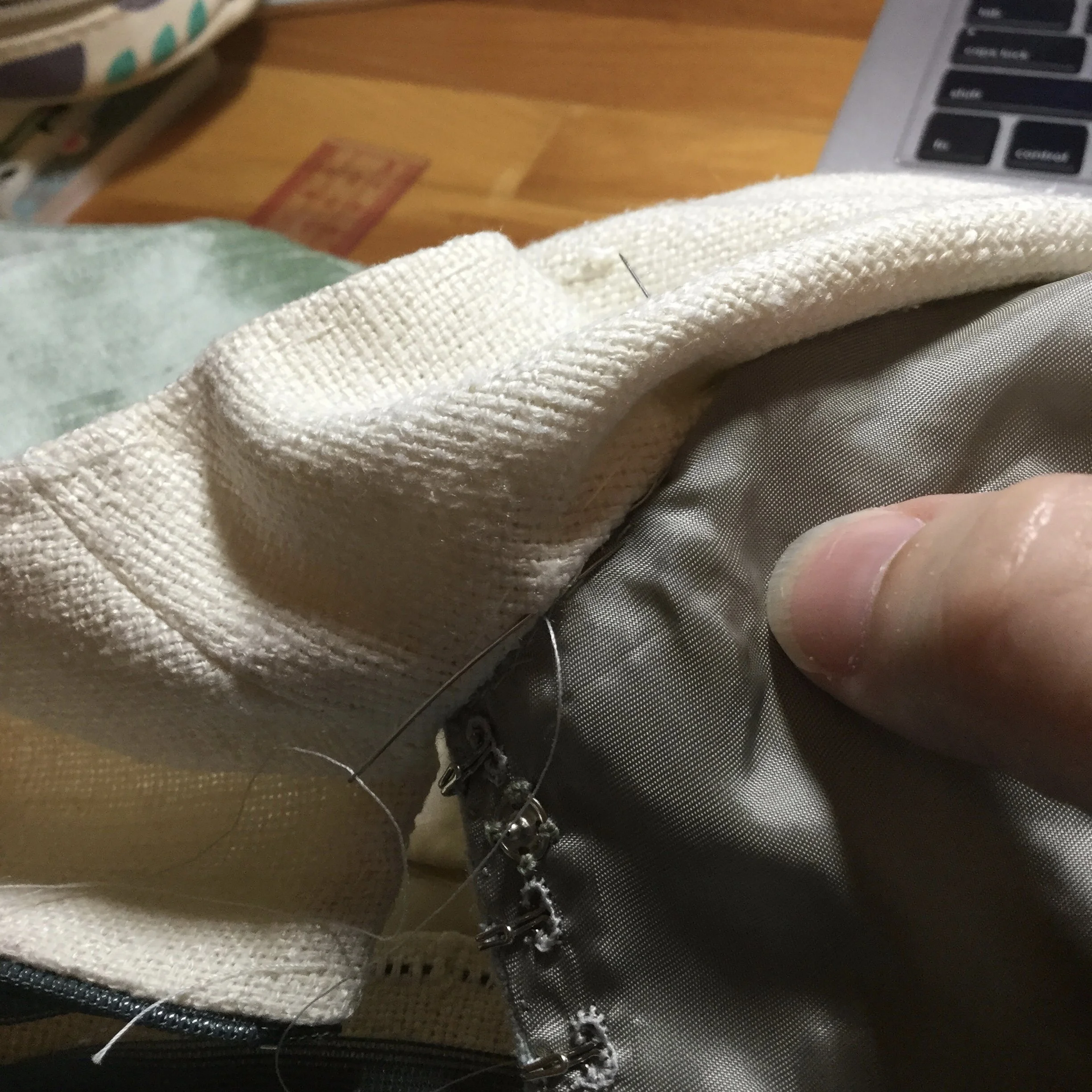 Stitching the collar to the front neckline.