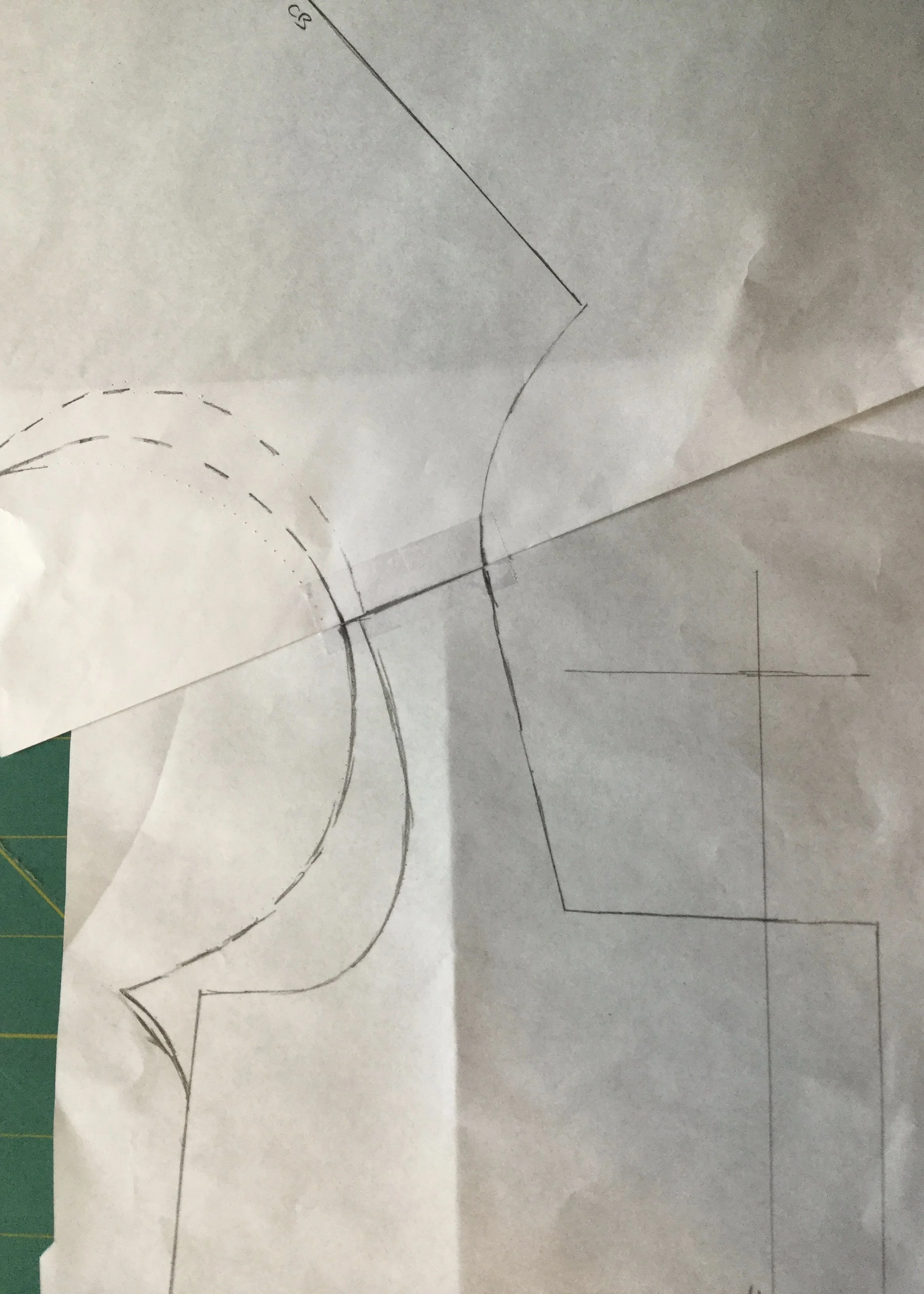 Redrawing the armhole.