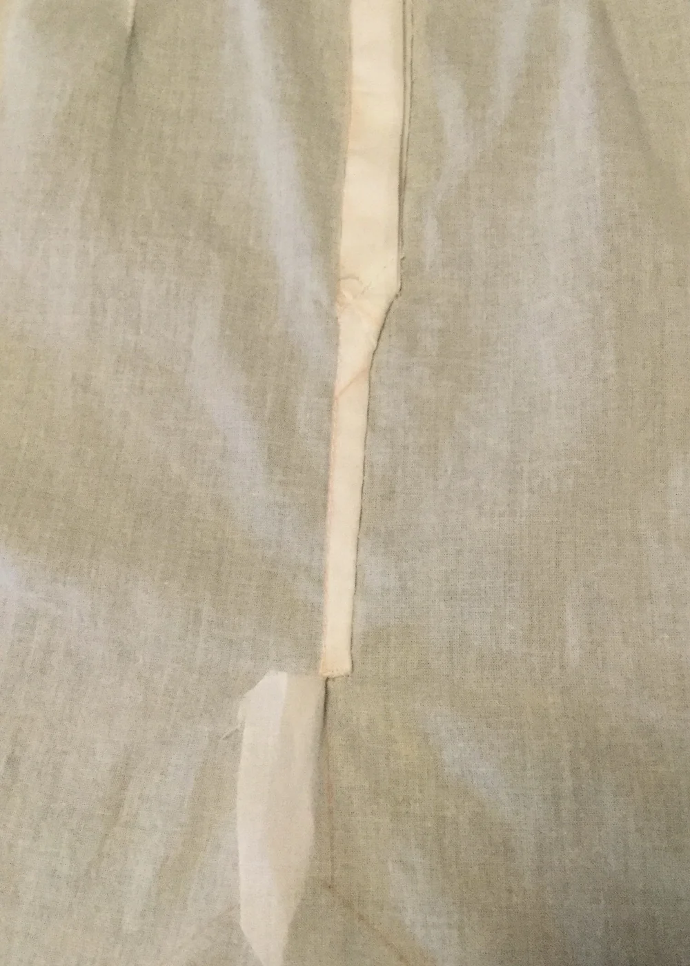 Base of front opening, inside.