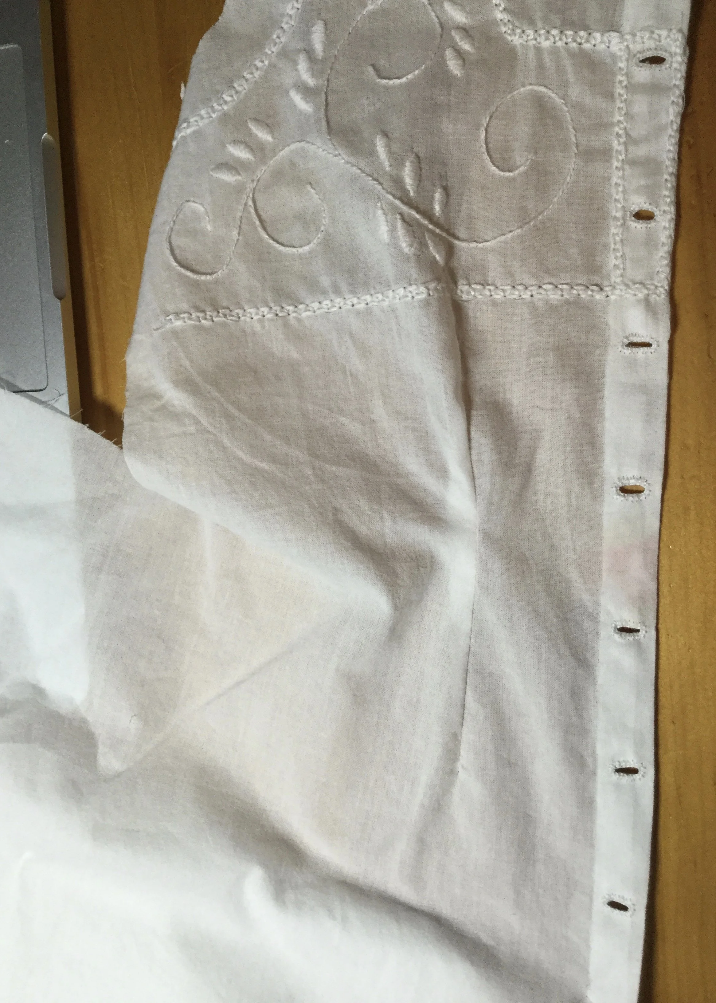 Buttonholes.