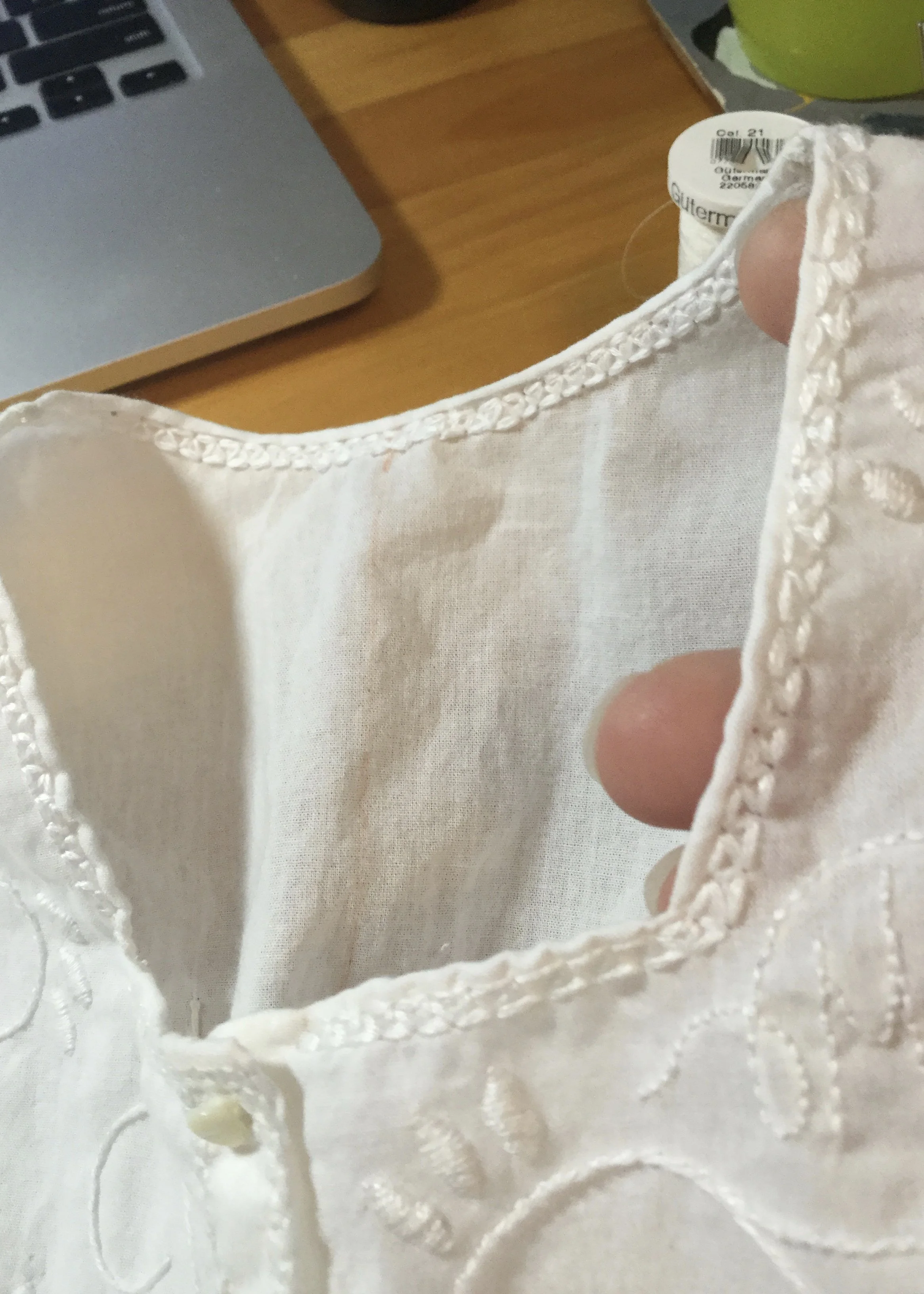 Rolled hem around neckline.