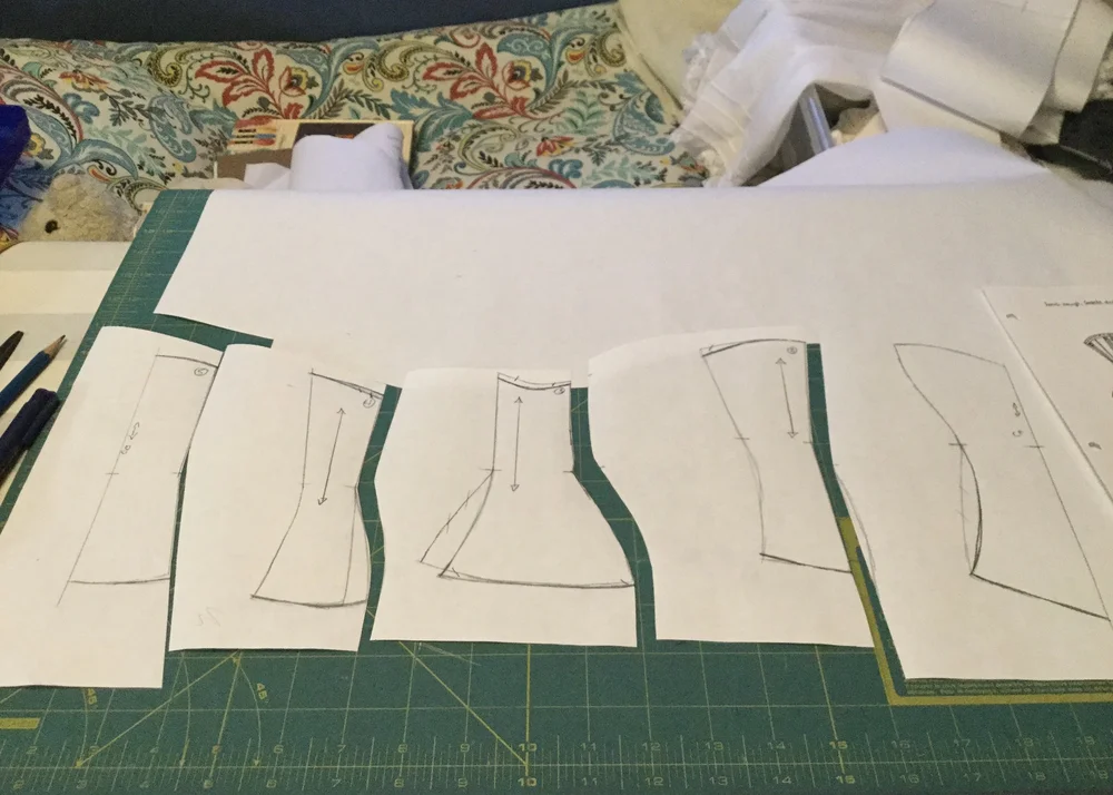 Adjusting and truing up the pattern pieces.