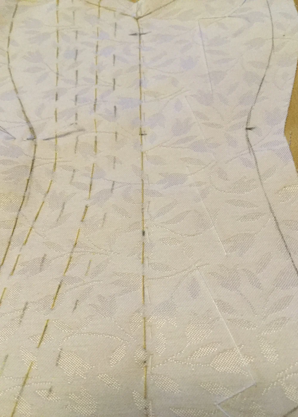 Basting the facing to the front.