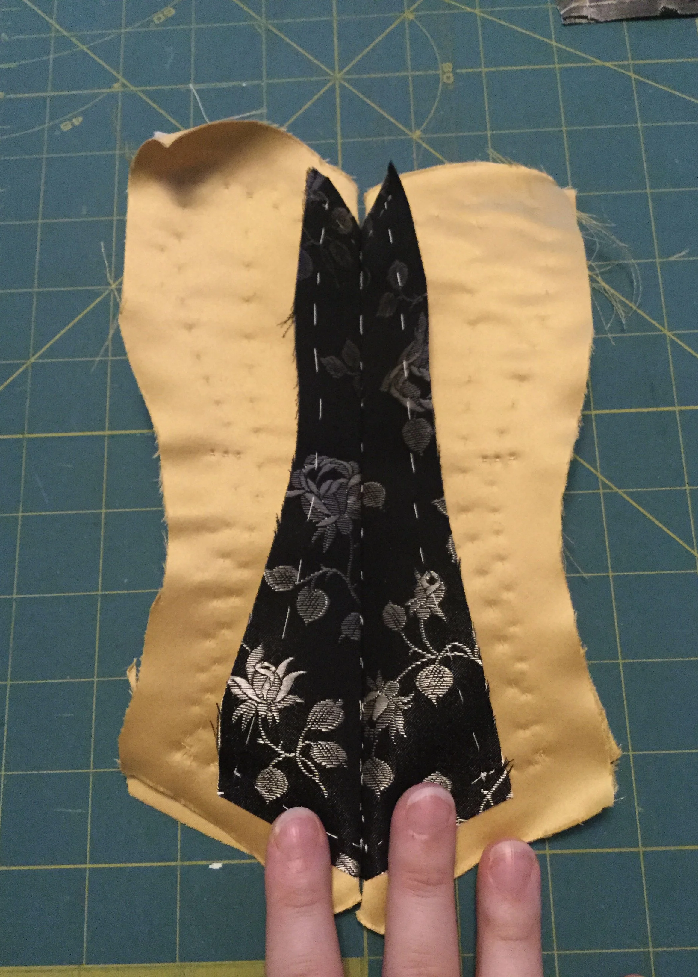 Opening the centre front seam.