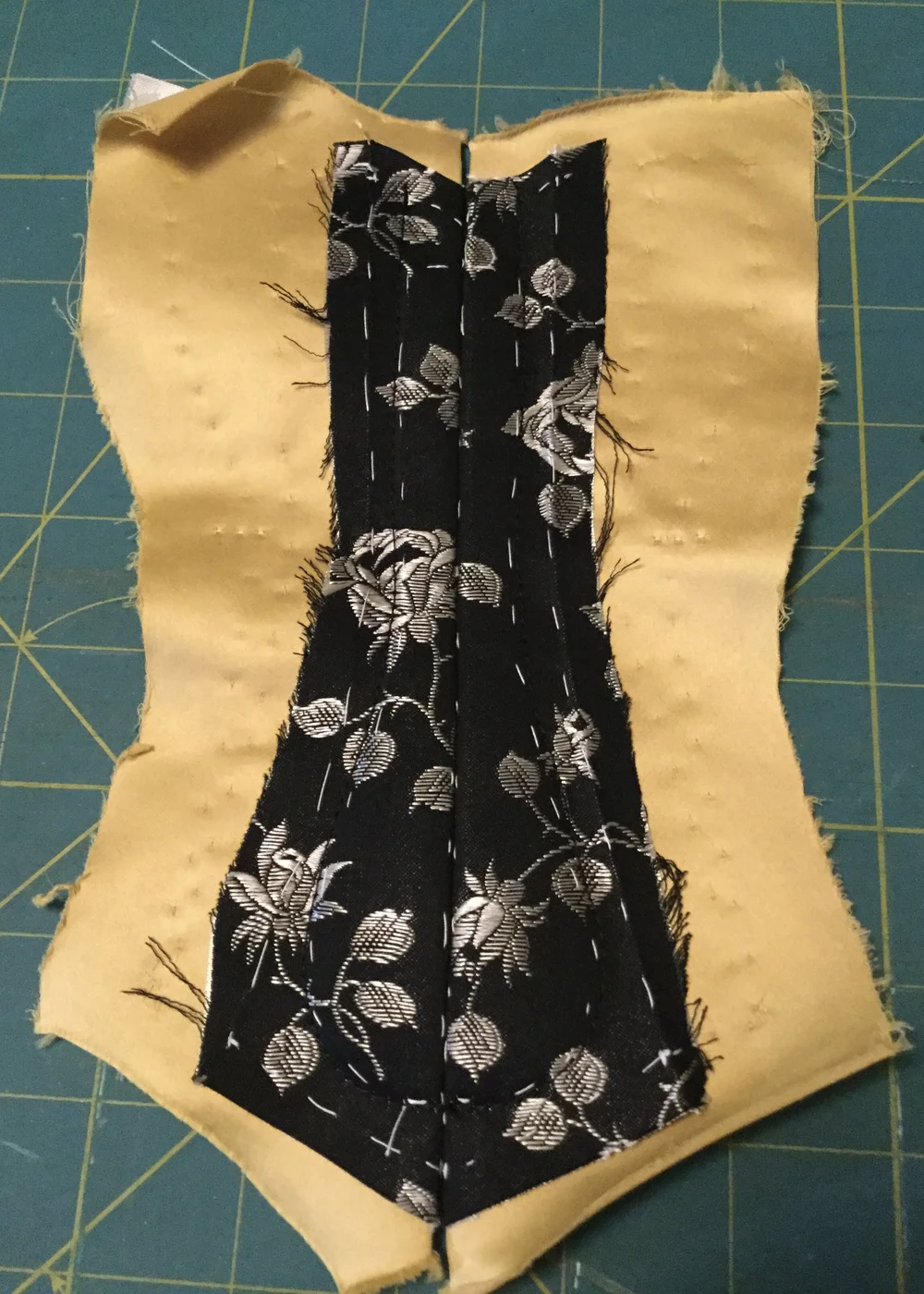 Busk sewn in but before the great fiddliness.