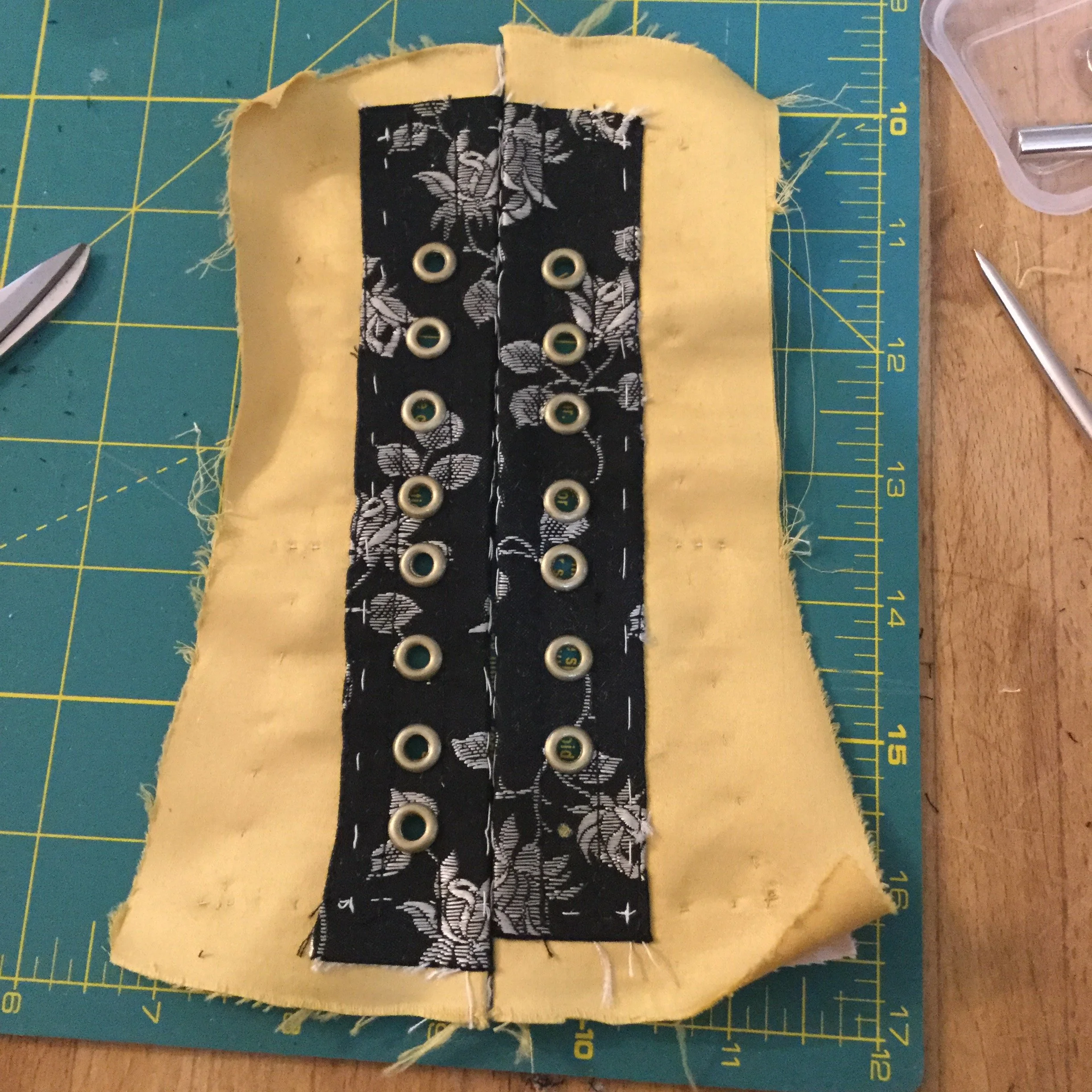 Almost all the eyelets are in place.