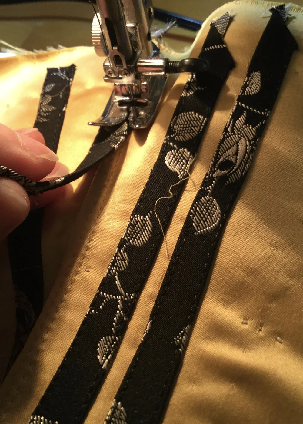 Applying casing over the seams.