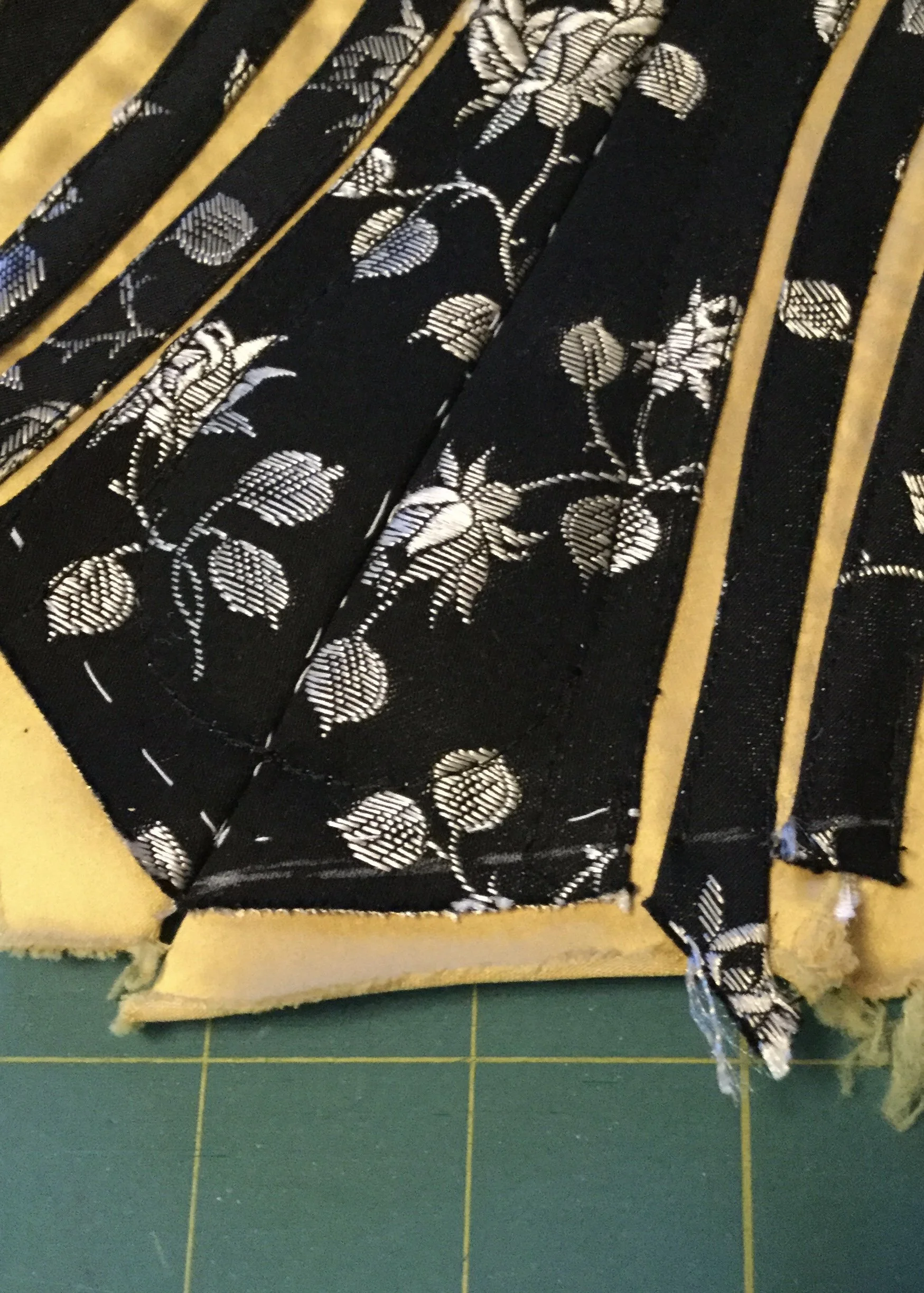 Redrawing the bottom edge at the centre front.
