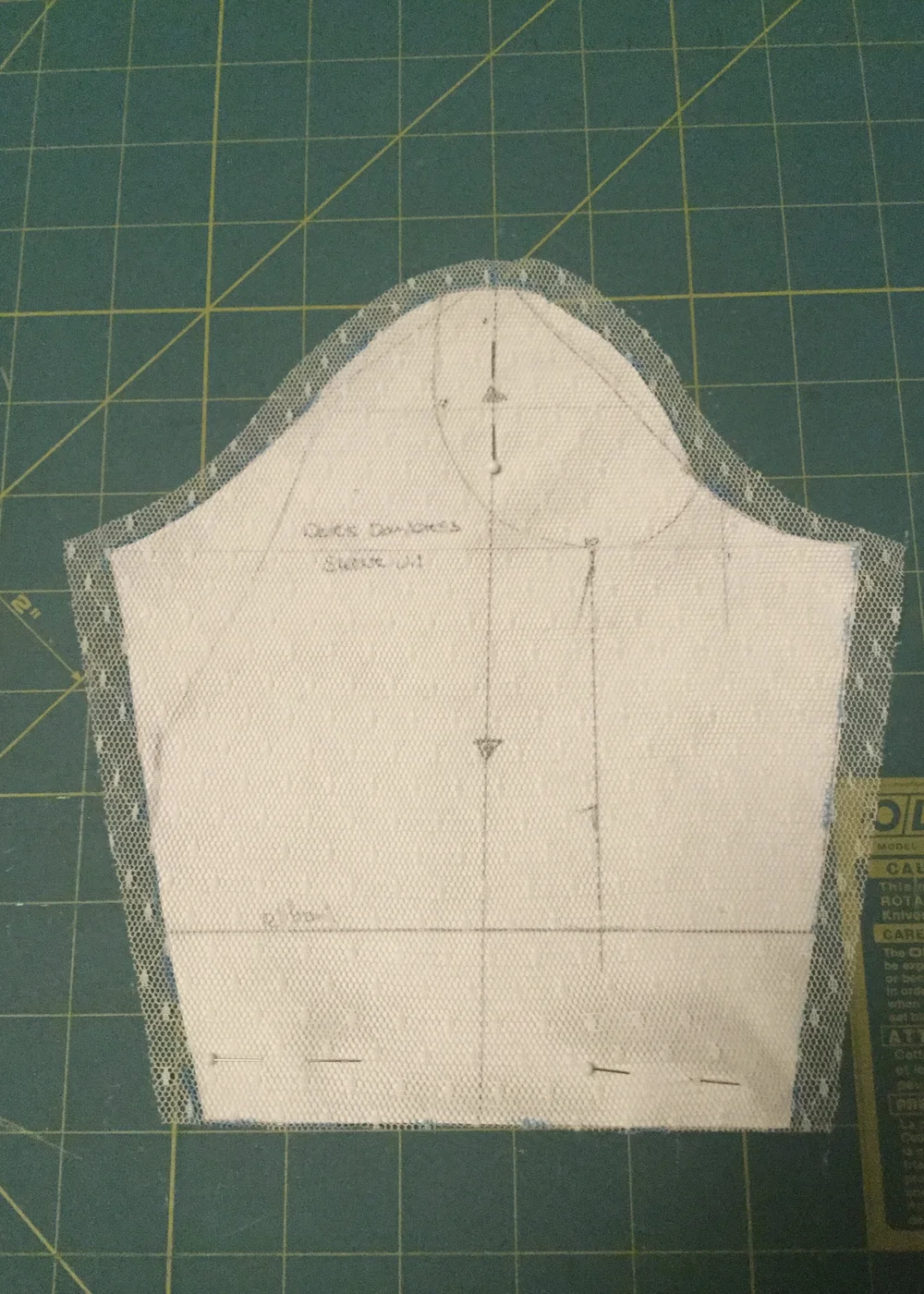 Cutting the mock up sleeve.