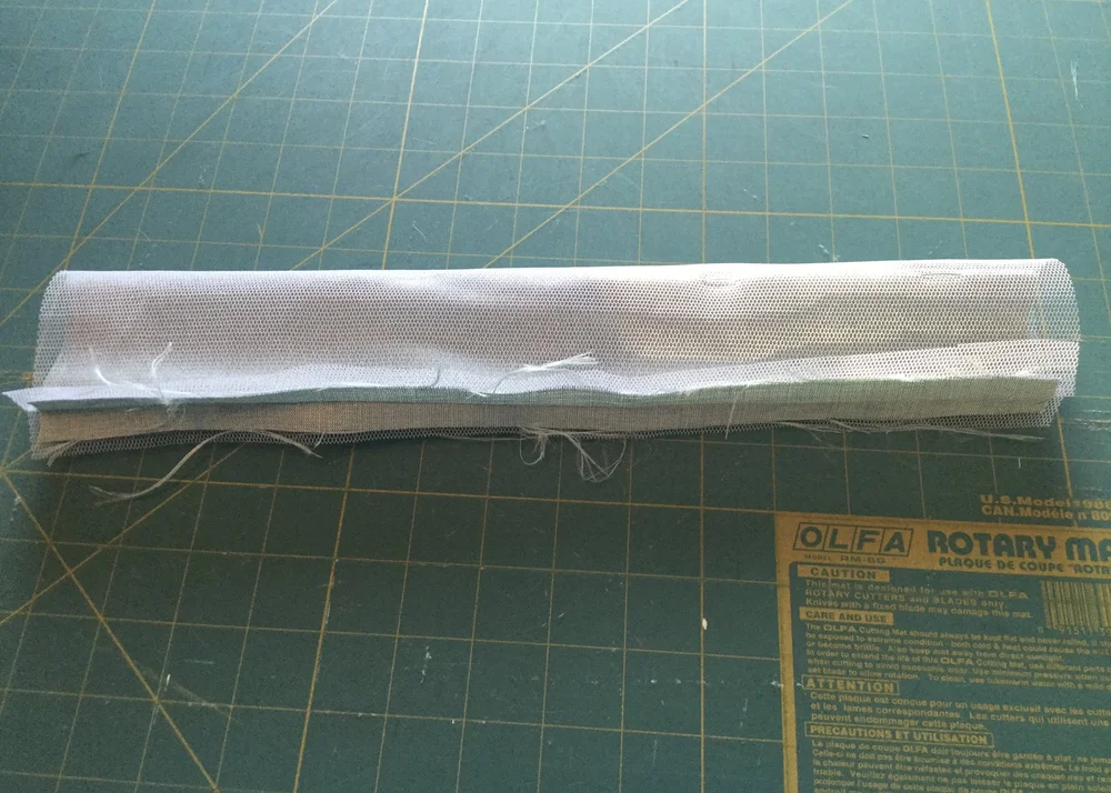 Stitching the tube.