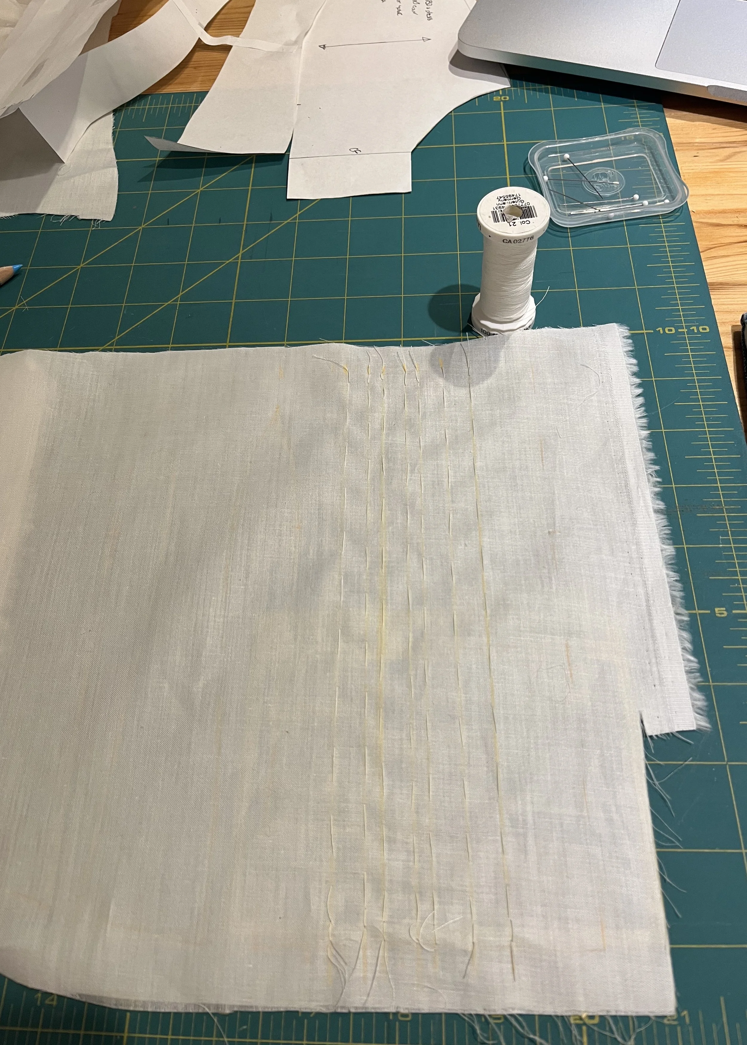 Basting pin tucks (wrong side).
