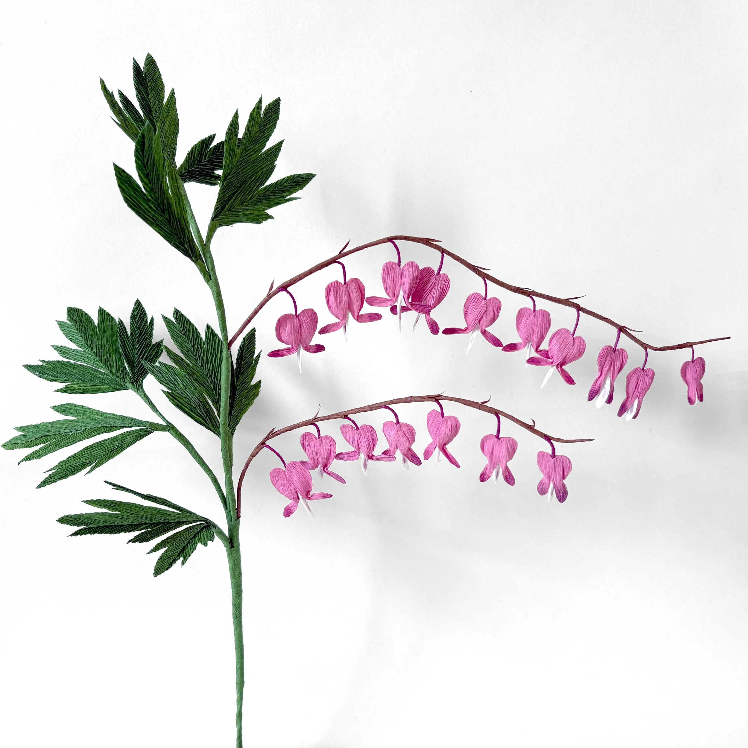 This month we are going to make Bleeding hearts, we actually have them in our garden for a closer look. I have to admit it might be one of the trickiest flower to make and explain. due to its very 3D shape. 😊
.
If you are interested, our tutorial is