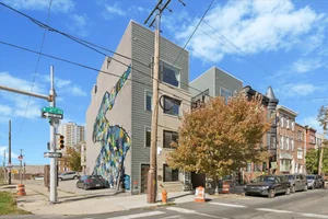 Twinkling Lights, Private Entrance, and Queen Village at Your Doorstep: A Condo Worth Coming Home To