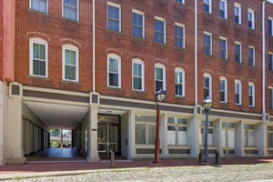 Old City Living with a Fireplace, Roof Deck Access, and Walkable City Convenience