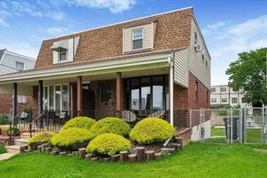Well-Maintained Academy Gardens Home with Finished Basement and Private Backyard