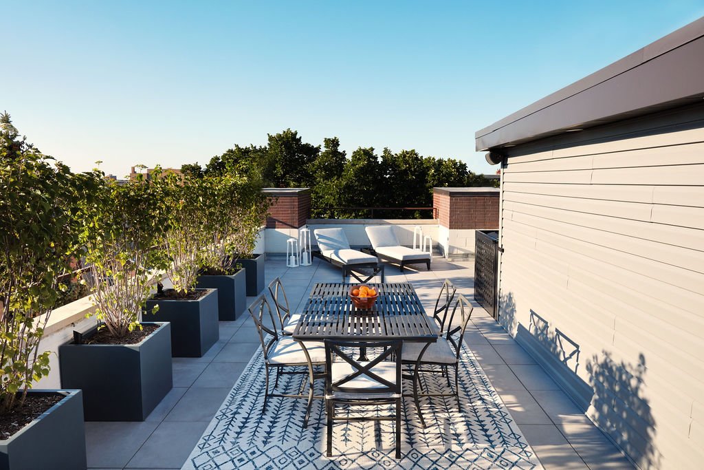 Rooftopia-chicago-westtownrooftopdeck-outdoordesign-pergola-customoutdoorkitchen-outdoorlighting-outdoorplanters-outdoorfurniture-rooftopdesign.jpg