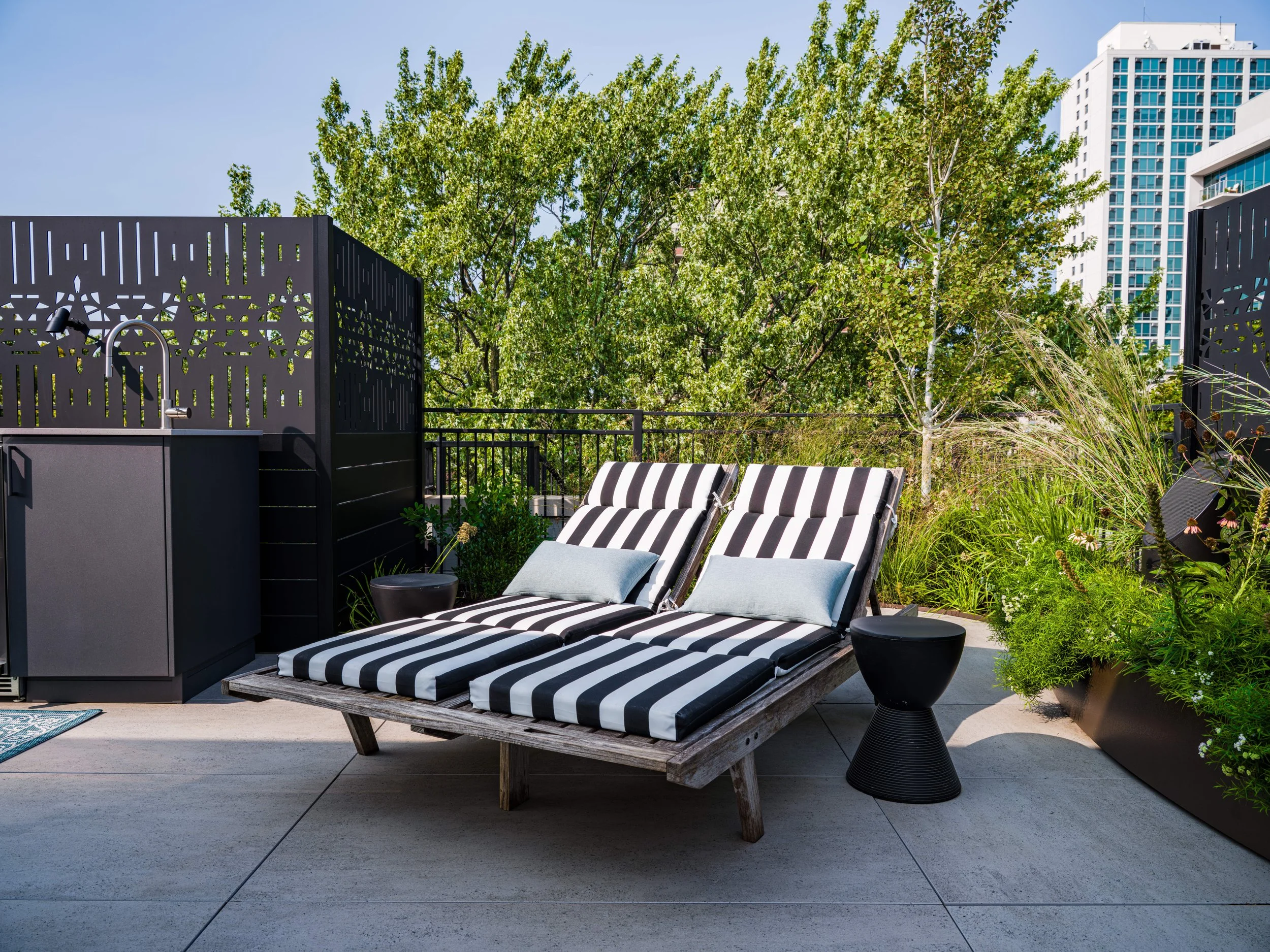 Rooftopia-wrigleyville-outdoor-rooftop-deck-lounge-planters-plants.jpeg