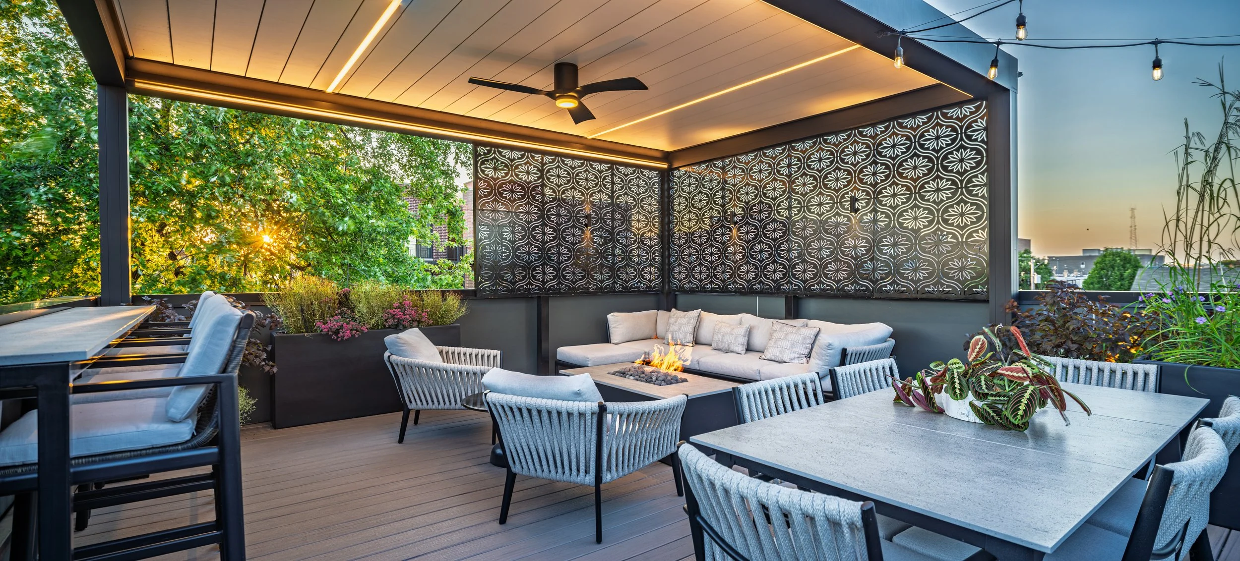 Rooftopia-rooftop-deck-pergola-custom-screens-firetable-seating.jpg