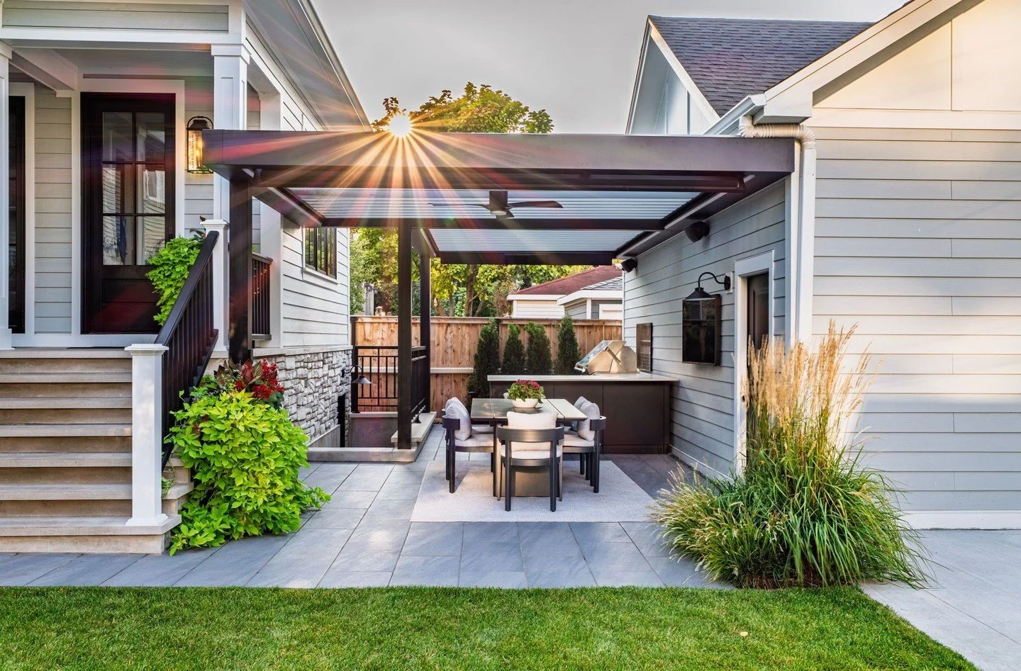 We love our repeat clients that trust us to seamlessly incorporate a lawn area, dining area and front landscape. We worked with our trusted partners to create an outdoor chicago oasis with lot's of greenery, a large outdoor kitchen area and plenty of