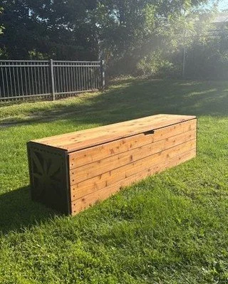 We love finding creative solutions that blend beauty and function.

For this project, we designed and built a custom cedar bench that not only creates a warm, inviting space&mdash;but also cleverly conceals less desirable elements like a spigot, outl