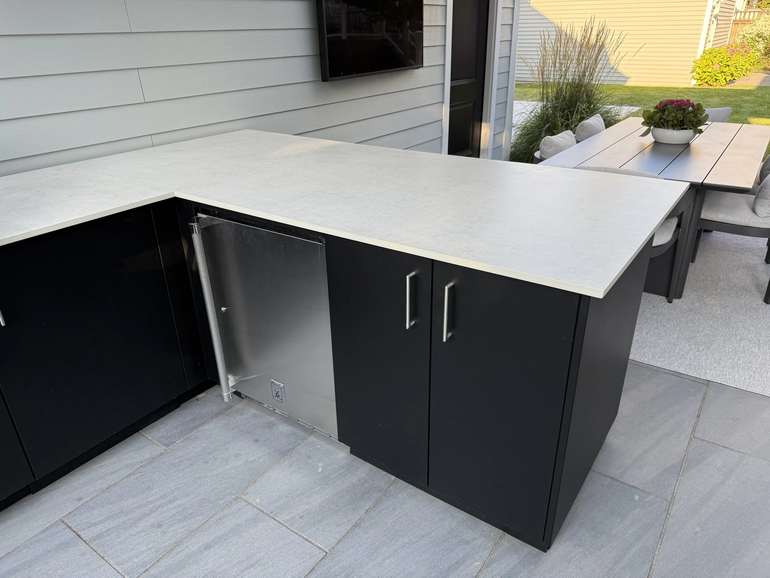 Backyard-outdoor-kitchen-cabinets-dekton-countertops-rooftopia-chicago.JPG