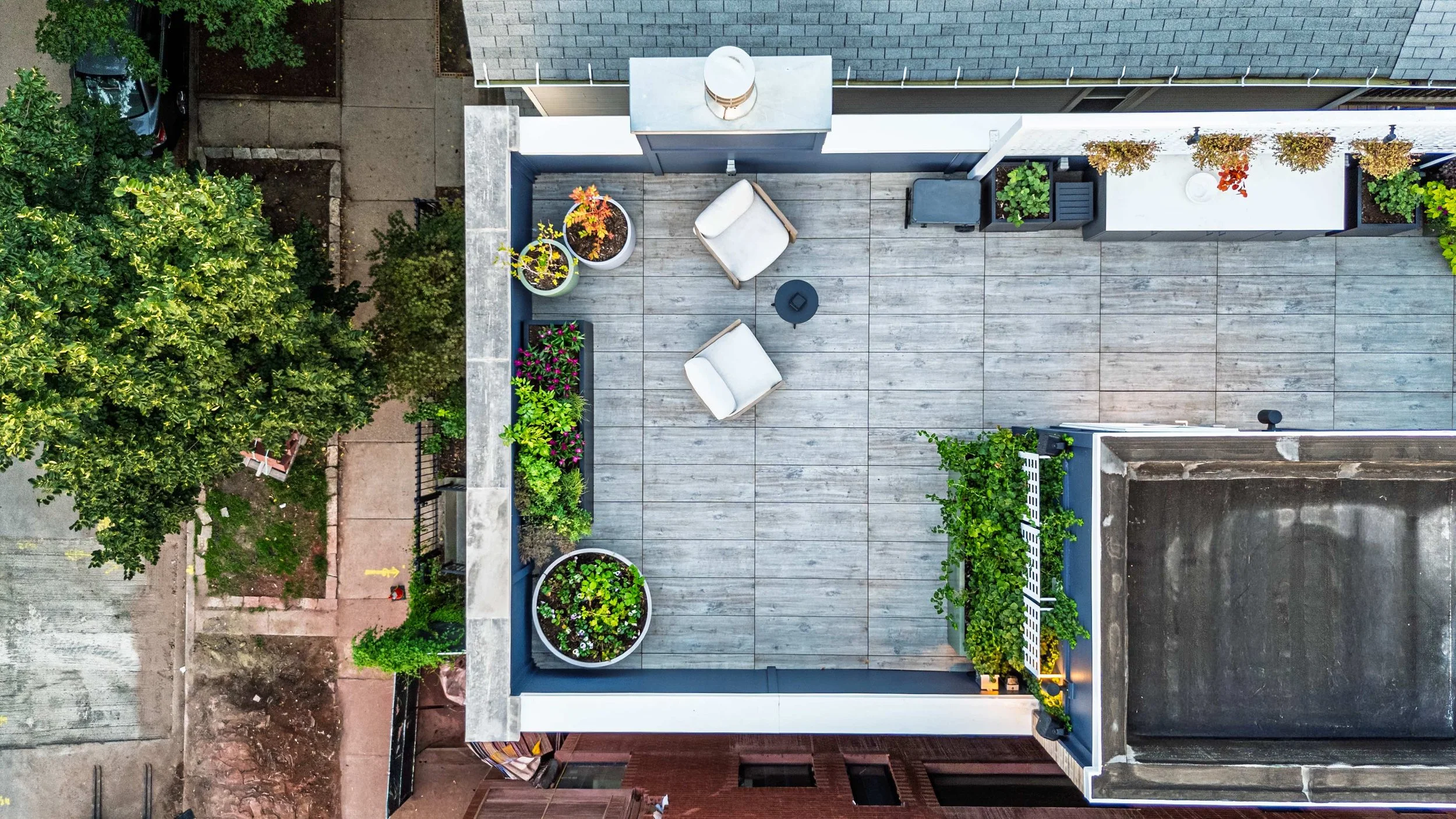 Rooftop overhead planters kitchen sitting area rooftopia.jpg