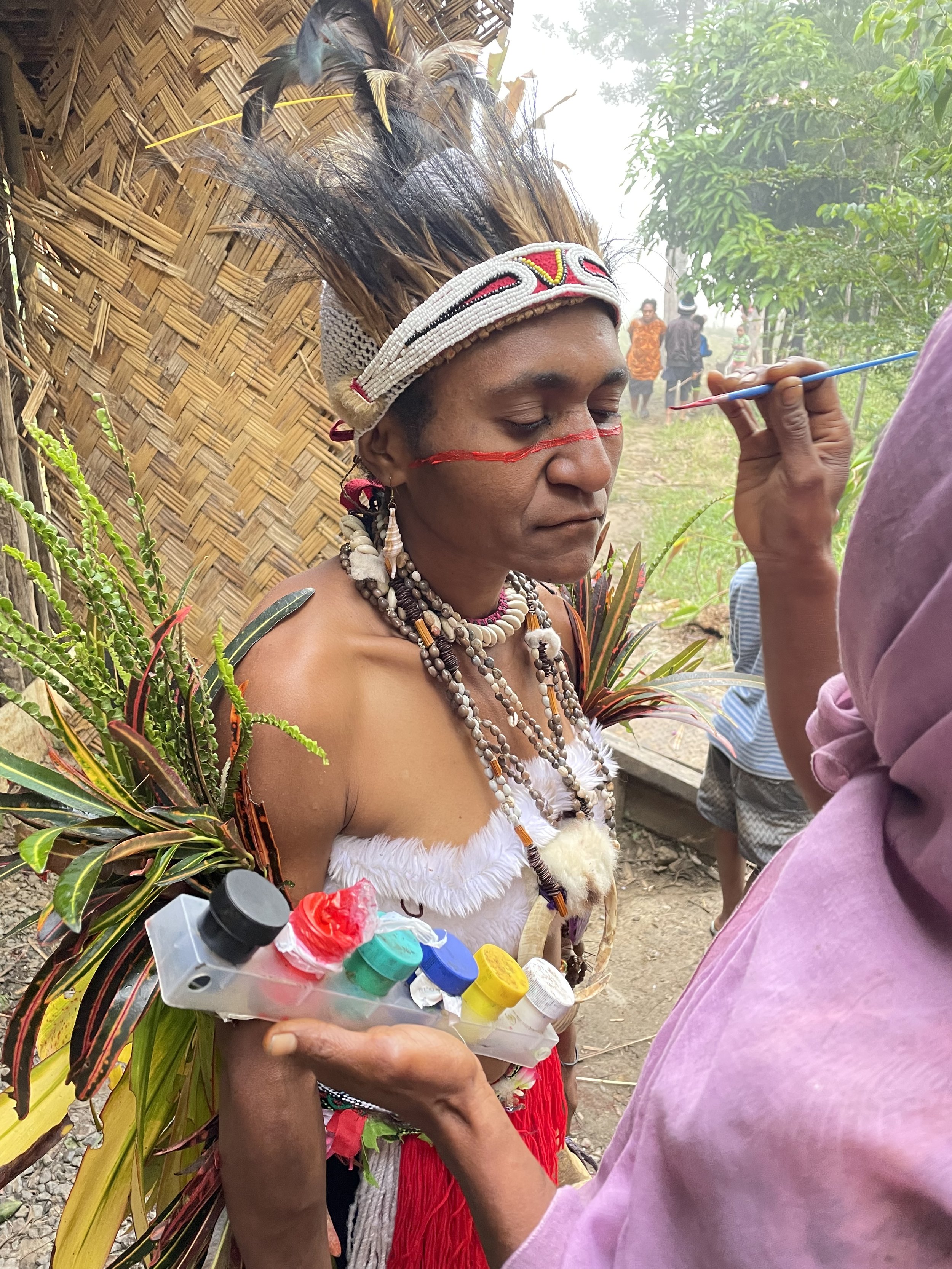 Local ladies in traditional dress getting ready for a big fesival