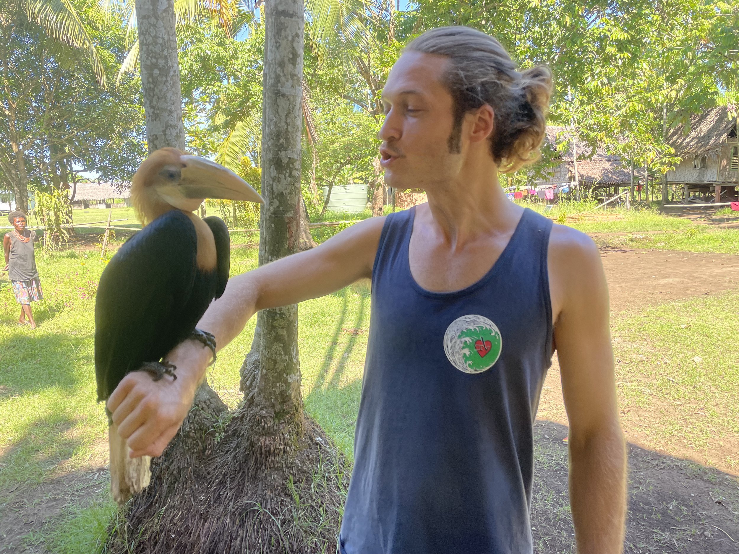 Luke holding a pet horn bill.