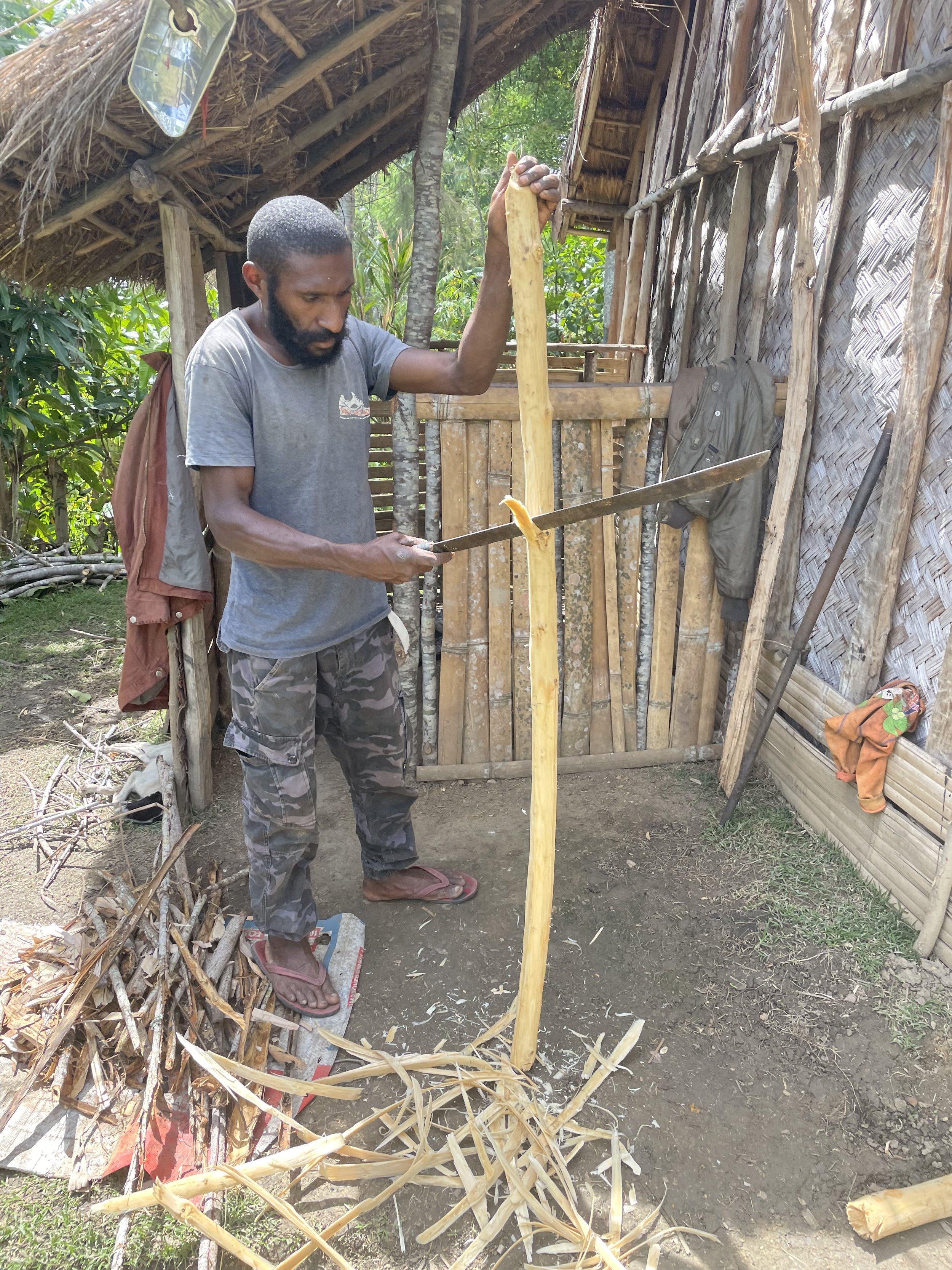 Peter making the handle for my gardening shovel.