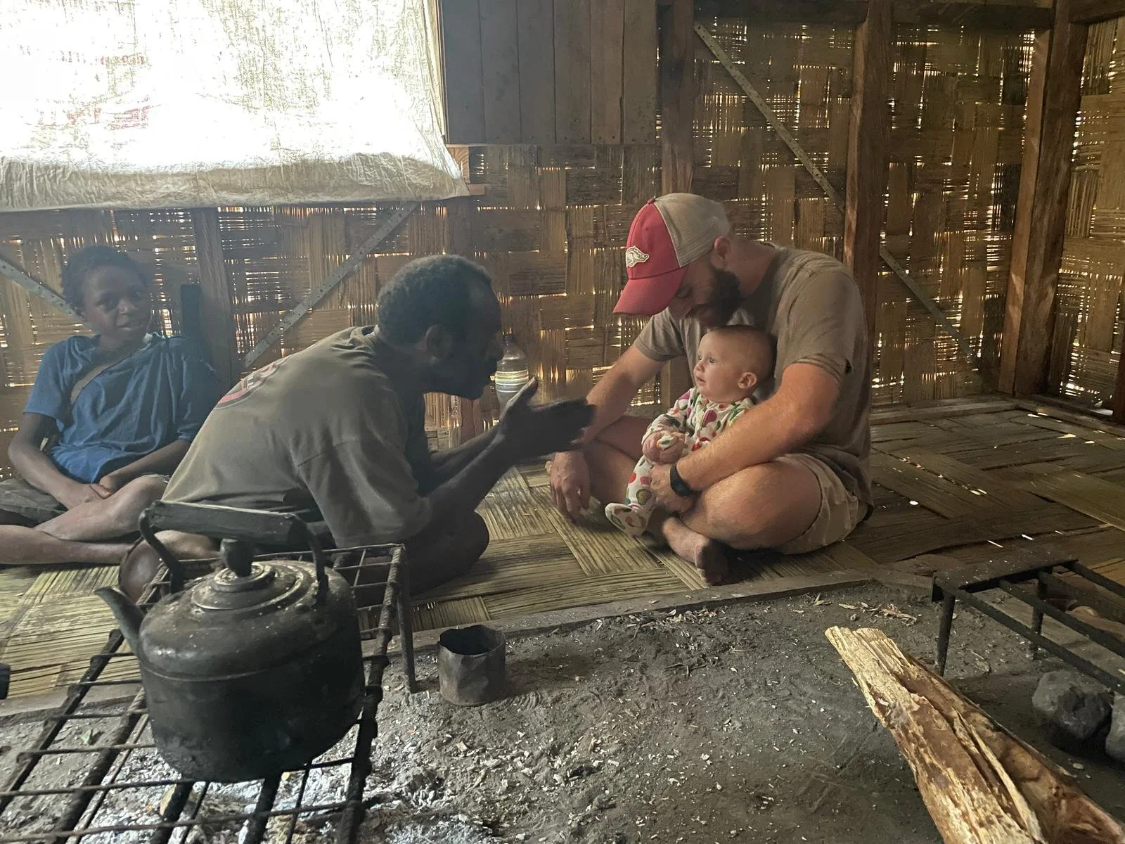 everyone loves babies! Our Uruwa friends meeting Shiloh - the Brendle's baby!