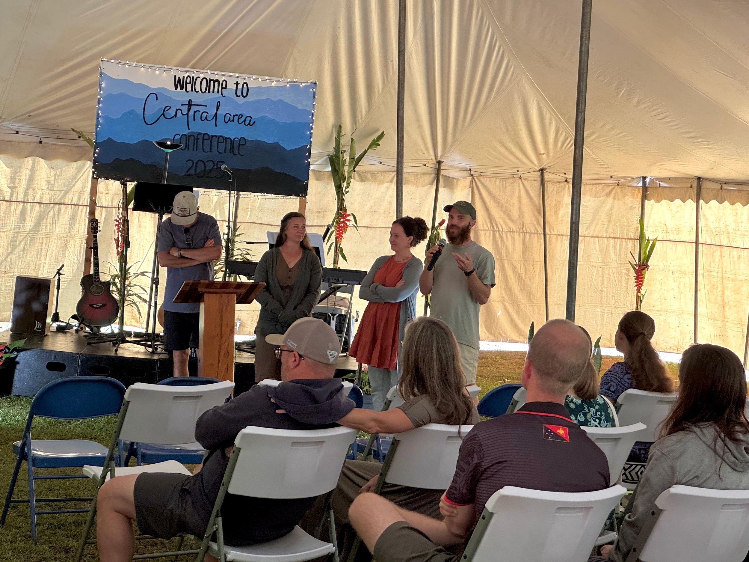 our co-workers sharing about our ministry at the annual missionary conference 