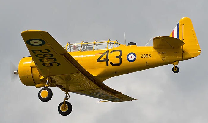 The Vintage Wings of Canada Harvard 4 takes off shortly after her debut in the markings of a Harvard that was flown in these very same skies by one of the RCAF’s and aviation’s most tragic sons, John Gillespie Magee. Photo: Peter Handley