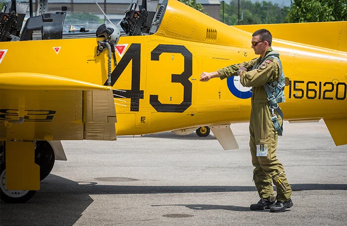 A young Royal Canadian Air Force pilot prepares for the heritage flight. John Magee, at just 18 years of age when flying Harvards would have been considerably younger than today’s military student pilot or, as in this case, instructor pilot. Photo: Peter Handley
