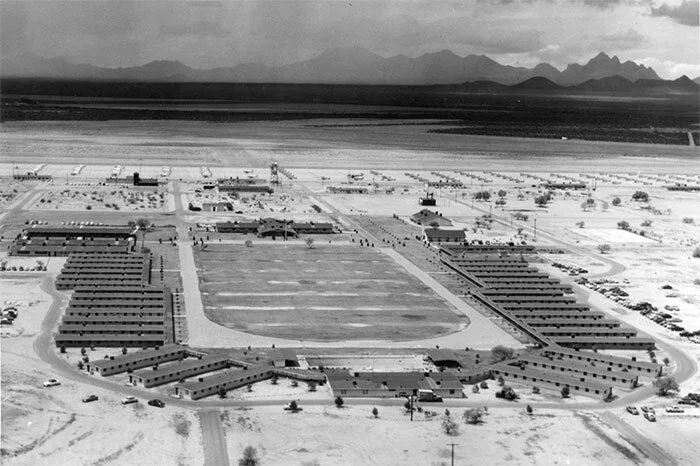 A great photo of Marana Air Force Base in 1956 during its heyday showing the barracks complex and parade ground and the flightline in the distance. Operated by Darr Aeronautical Technical Company from 1951 to 1957, the base was closed by President Eisenhower along with 29 others. It was a shame to close this particular base since, according to former USAF pilot Dale Elliott who trained in the area, there was not one flight cancelled due to inclement weather during its years of operation. Photo via tucson.com