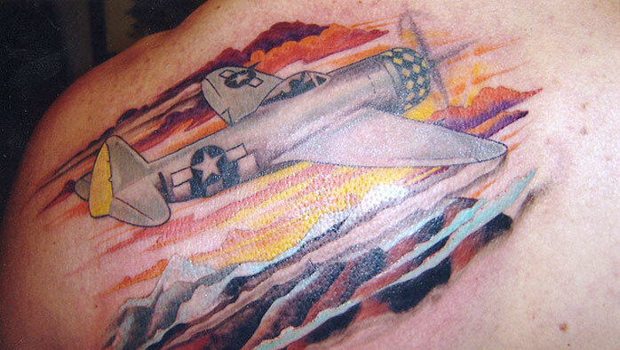 Linear black and grey airplane tattoo - Tattoogrid.net