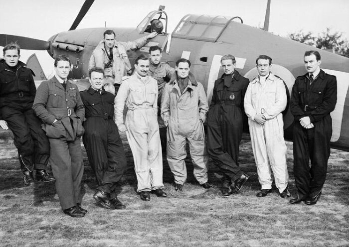 Among the greats. Douglas Bader (fourth from right), the English flying legend, commanded 242 Canadian Squadron RAF. At the beginning of the war, the RCAF had not yet equipped and assembled squadrons for deployment in Europe. There were however many Canadians who were either in the RAF, or who were RCAF in the Royal Air Force. In order to show Canadians back home that their boys were fully engaged in the war, it was decided to create a special squadron (242) manned by Canadians already in the RAF. This squadron assembled some of the finest talent of the war—young fighter pilots from across the land, now seen fighting the Nazis as a cohesive unit. This photograph was taken at RAF Duxford in September of 1940. Left to right: Future Air Marshal Sir Dennis Crowley-Milling, KCB, CBE, DSO, DFC and Bar, AE (Wales), Flight Lieutenant Hugh Tamblyn, DFC (Watrous, Saskatchewan), Stan Turner, DSO, DFC, CD (Collingwood, Ontario), Sergeant Joseph Ernest Savill (on wing, British), Pilot Officer Norman Neil Campbell (St. Thomas, Ontario), Flying Officer Willie McKnight, DFC and Bar (Calgary, Alberta), Douglas Bader, Flight Lieutenant George Eric Ball, Pilot Officer Michael G. Homer and Flying Officer Marvin “Ben” Brown (Kincardine, Ontario). Within a year, McKnight, Tamblyn, Campbell, Homer and Brown would be dead. Bader would be shot down and captured and Ball would die in a flying accident having just survived the war. Photo: Imperial War Museum