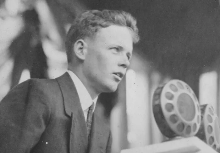 One can read a couple of important things in this image of Lindbergh addressing the crowd on Parliament Hill in downtown Ottawa. The first thing that strikes you is his undeniable youth. At the time, Lindbergh was just 25 years old. Secondly, w…