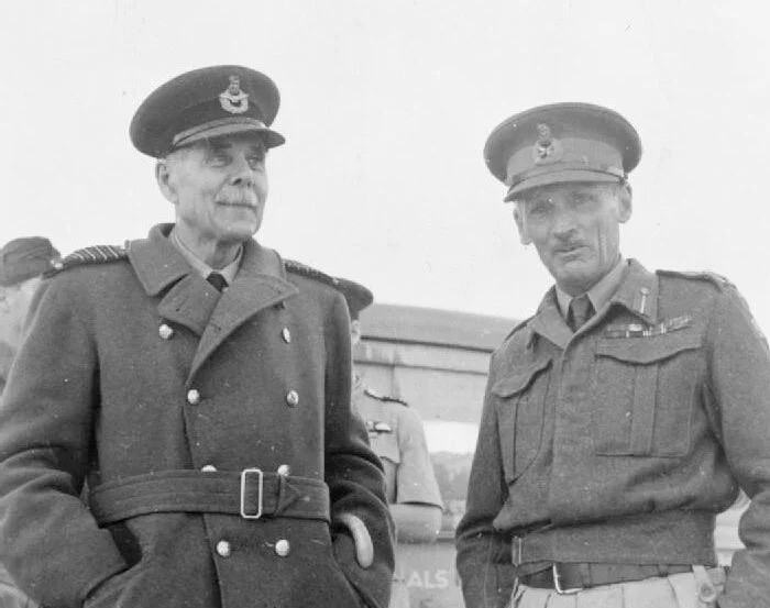 Hugh “Boom” Trenchard (left, seen here with Field Marshal Montgomery) is often described as the Father of the Royal Air Force. Learning to fly before the beginning of the First World War (his aviator’s certificate numbered 250), Trenchard rose to become Chief of the Air Staff by war’s end. He presided over the formation of the Royal Air Force in 1918, and commanded it for the next 12 years. He earned the sobriquet “Boom” for his loud, booming voice. By the Second World War, he was largely marginalized, being offered, but not accepting positions such as oversight of the BCATP in Canada or the task of camouflaging Great Britain. He was also offered responsibility for Air, Land and Sea forces for Great Britain should the Germans invade. Trenchard replied that this would mean he should have the powers of the Deputy Minister of Defence, which infuriated Churchill. Churchill then offered him the responsibility for reorganizing Military Intelligence, which he also declined. In the end, the stubborn Trenchard had manoeuvred himself from any real power in the war machine and spent the rest of his war years as de facto RAF ambassador and Inspector General. Regardless, he was considered RAF Royalty by his men and was accorded great respect. To fly him, as Trevor Southgate did, was an honour. Photo: Imperial War Museum