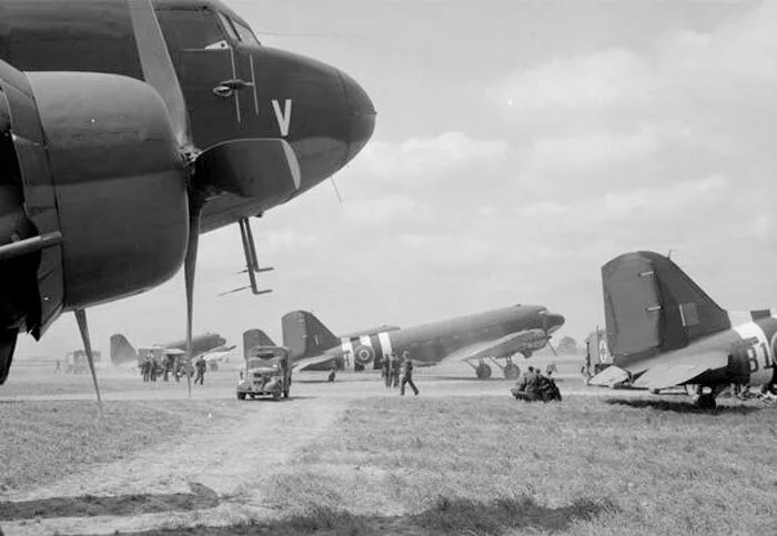 Shortly after the D-Day landings, Southgate’s 512 Squadron was in the thick of things as part of 46 Group, operating from an airfield known as B2-Bazenville. Here, Douglas Dakota Mark IIIs of No. 46 Group at B2-Bazenville, on the Normandy coast, are loading casualties for evacuation to the United Kingdom. Dakota KG432 ‘H’ of No. 512 Squadron RAF is at centre. When B2 first opened, the front line was only 9 kilometres away. The first aircraft to land at Bazenville were the Spitfires of 127 Group of the Royal Canadian Air Force on 11 June. Photo: Imperial War Museum