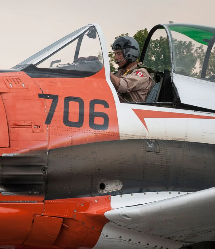 A good portrait of Evans at the controls of his T-28 as he warms her up prior to departure for another flight a couple of days after our adventure. For great video of Bruce Evans sharing the “aero” experience with Vintage Wings volunteer Alan Shafto click here. Photo: Peter Handley