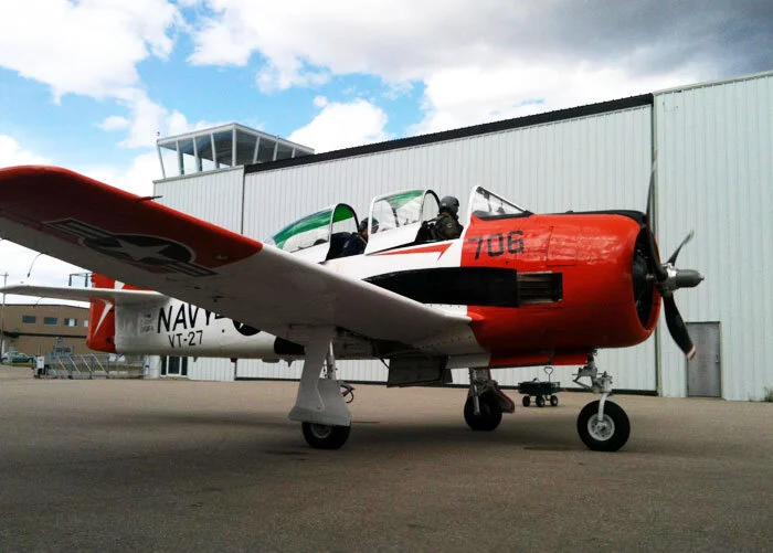 Bruce Evans warms up the Trojan on the ramp outside the Firefly Aviation hangar. Photo: Todd Lemieux