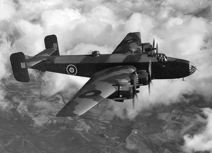 The Handley Page Halifax was a four-engined heavy bomber of the RAF, RCAF and RAAF during the Second World War, along with similar types like the Short Stirling and the famous Avro Lancaster. More Canadian airmen served with Halifax-equipped squadrons than on those employing the Lancaster. The Halifax could not carry the same payload as the Lancaster, but had a better reputation for survivability. While on squadron strength units of Bomber Command, Halifaxes flew 82,773 sorties and dropped a quarter million tons of bombs. The Bradford-on-Avon Halifax was one of 1,833 “Hali-bags” lost during training and operations. Photo: RAF