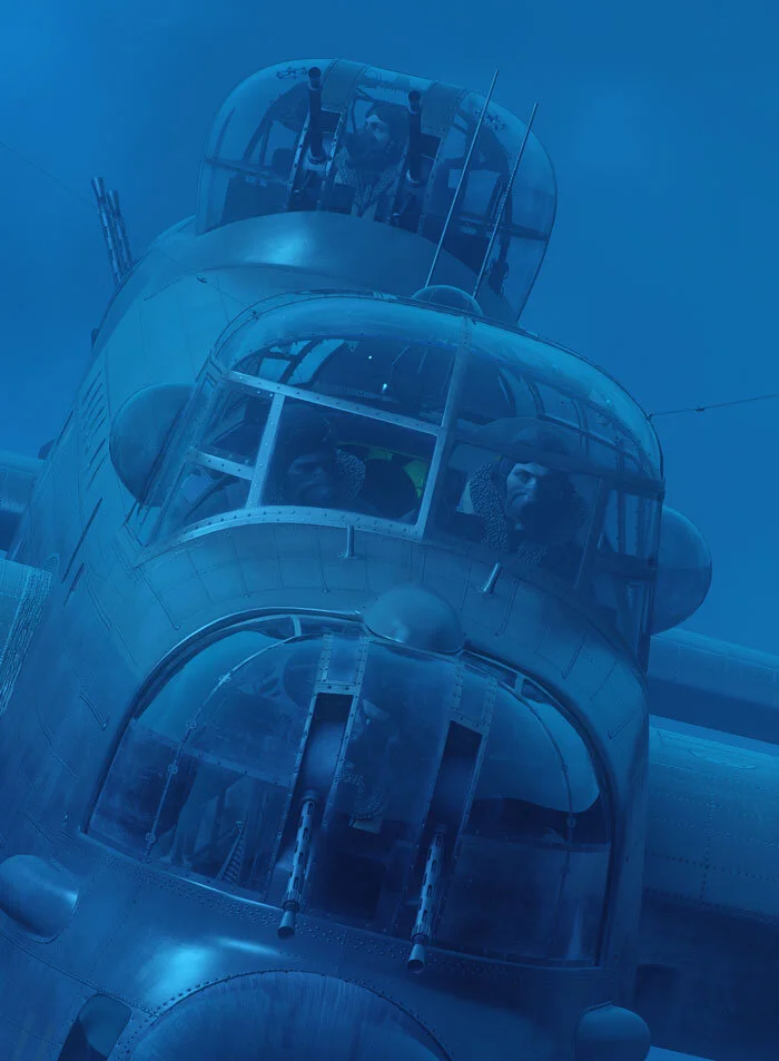 Forkasiewicz’s work enables us to see war machines and their crews as one blended unit and from angles never before imagined. In his work, Incoming Threat, we feel the loneliness and determination of a Bomber Command crew. In this view, we see details that truly set Forkasiewicz apart from other digital artists—moisture streams aft over the nose blister glass; the Bomb Aimer, Canadian G.A. Musgrove, can just be seen in the nose turret; and the rough seal where the wing joins the fuselage. Detail from Incoming Threat by Piotr Forkasiewicz