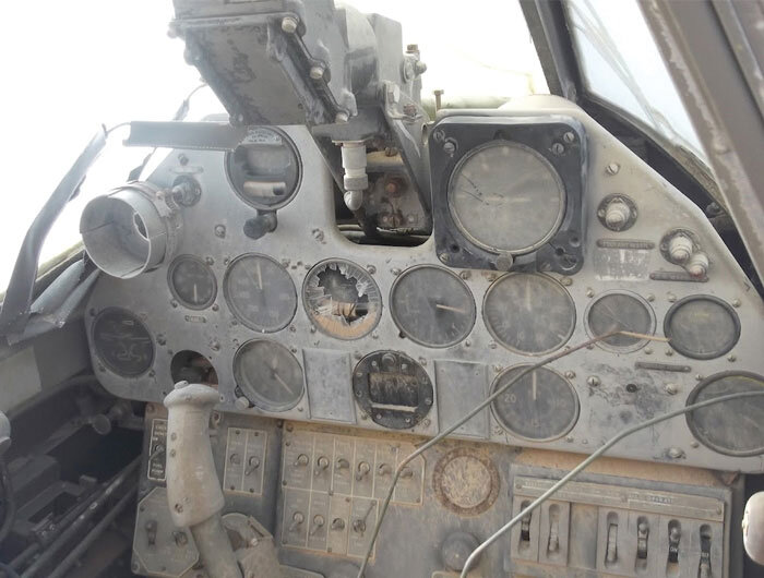 A shot of the cockpit of Dennis Copping's 260 Squadron Kittyhawk HS-B, now, 70 years after the day it came down, covered in dust, sand and grit. Compare the bakelite grip on the control column with ours and you will see that they are identical! Photo: Jakub Perka