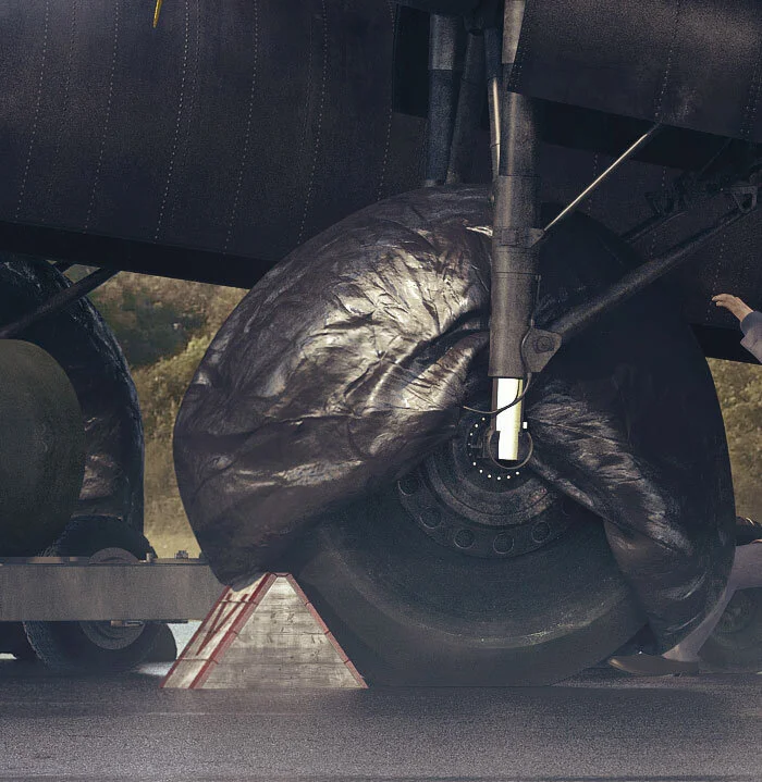 The artist has faithfully recreated the tarpaulin covers used by the RAF to prevent excessive deterioration of the natural rubber tires through exposure to sunlight as well as protecting the tires from oil drippings. Preparations by Piotr Forkasiewicz
