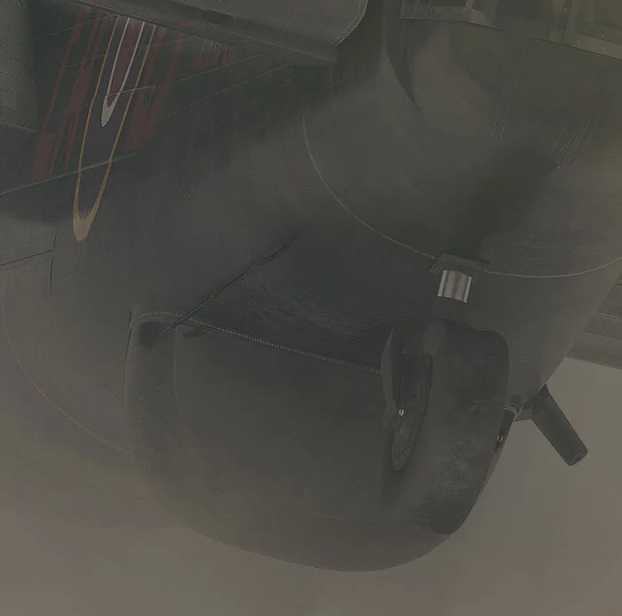 Note the wear on the anti-shimmy tire and the bead of rivets running round the HS-R blister. Detail from Through Clouds by Piotr Forkasiewicz