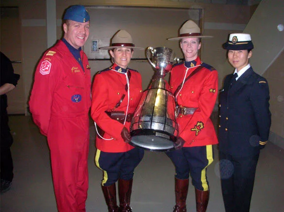 Moments before the Zap-to-end-all-Zaps was delivered, the members of the Grey Cup’s military and police escort pose for a picture taken by the Cup’s security guard. Photo via Rob “Scratch” Mitchell.