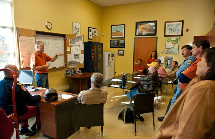 Balbo leader and Chief Pilot, Paul Kissmann, goes over plans with pilots before the historic flight. Photo: Peter Handley